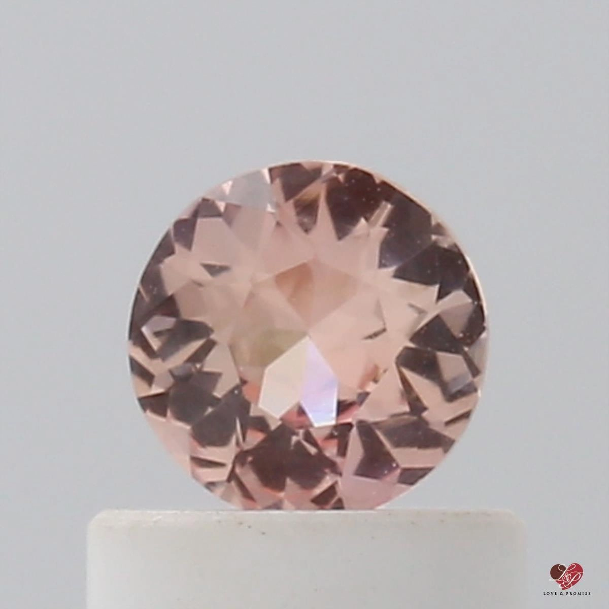 0.46cts Round Medium Warm Peach Sapphire