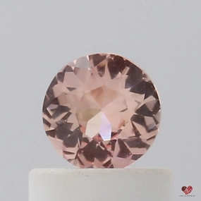 0.46cts Round Medium Warm Peach Sapphire