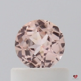 0.54cts Round Warm Peachy Blush Champagne Sapphire