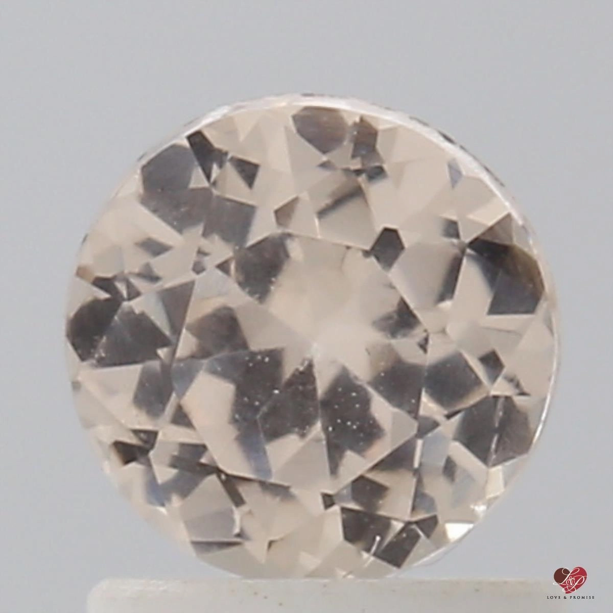 1.19cts Round Peach Blush Champagne Sapphire
