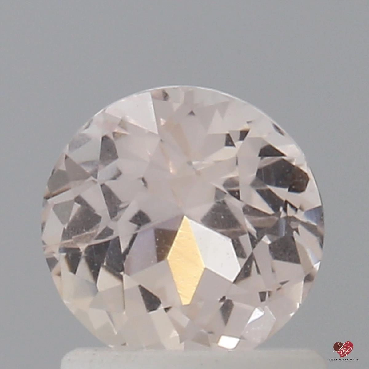 1.28cts Round Blush Champagne Peach Sapphire