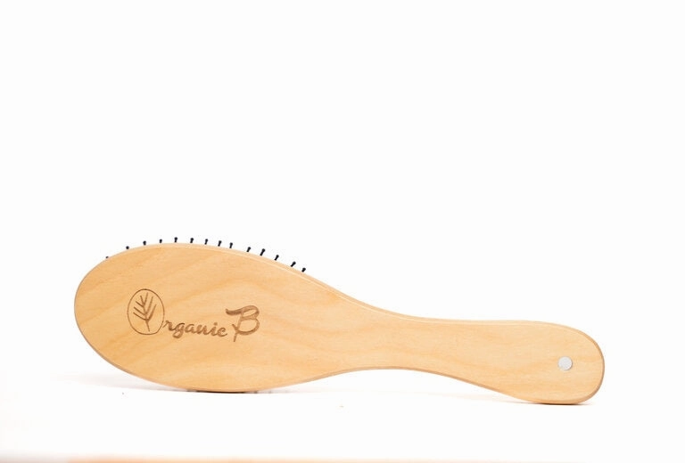 "Volumonising &  Anti-frizz Eco-strong Teak Paddle hairbrush | Oval, Small"
