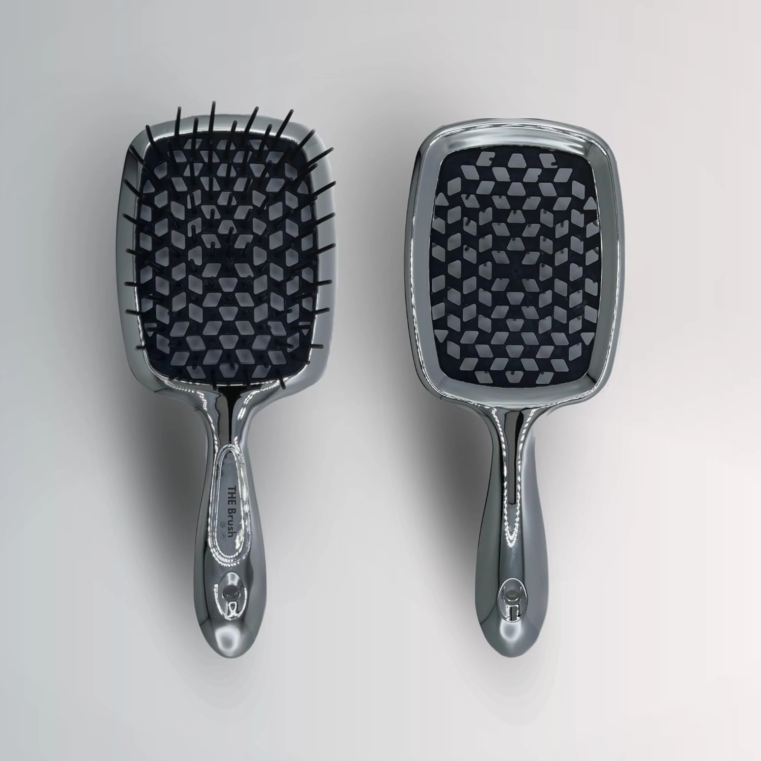 THE Brush hairbrush is your ultimate luxury detangling superbrush, available in chrome gold and silver. With versatile bristles for all hair types, wet or dry, this professional tool gently massages